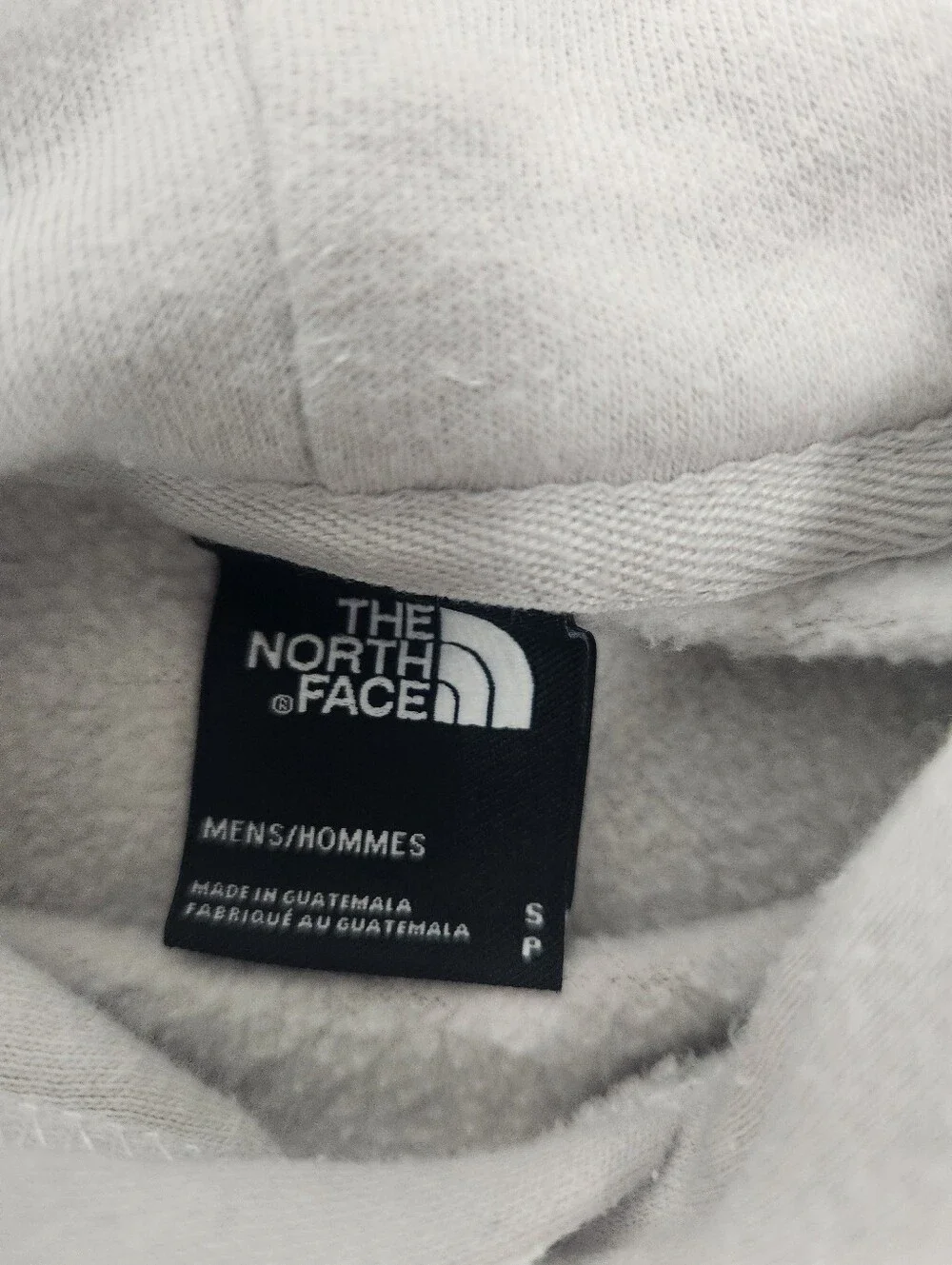 The North Face Never Stop Exploring Cream Hoodie with Blue & Purple Graphic